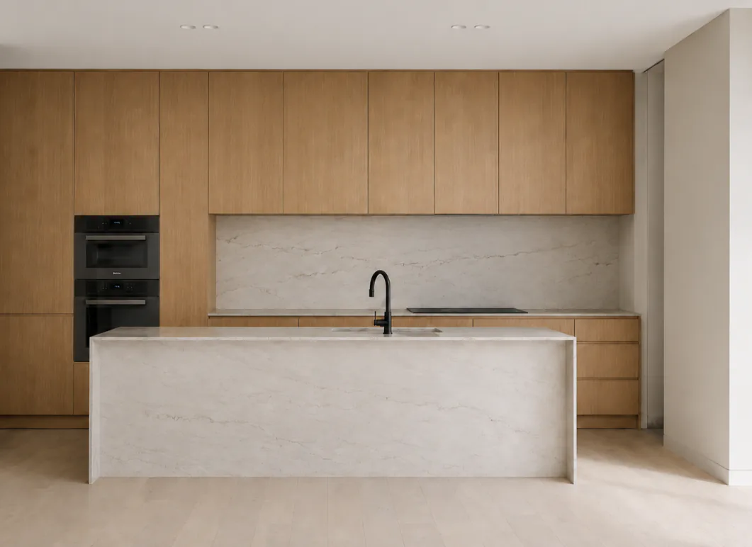 Minimal Nordstrand kitchen renovation with oak cabinetry and stone island